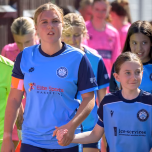 Amelia Robertson walks out her mascot